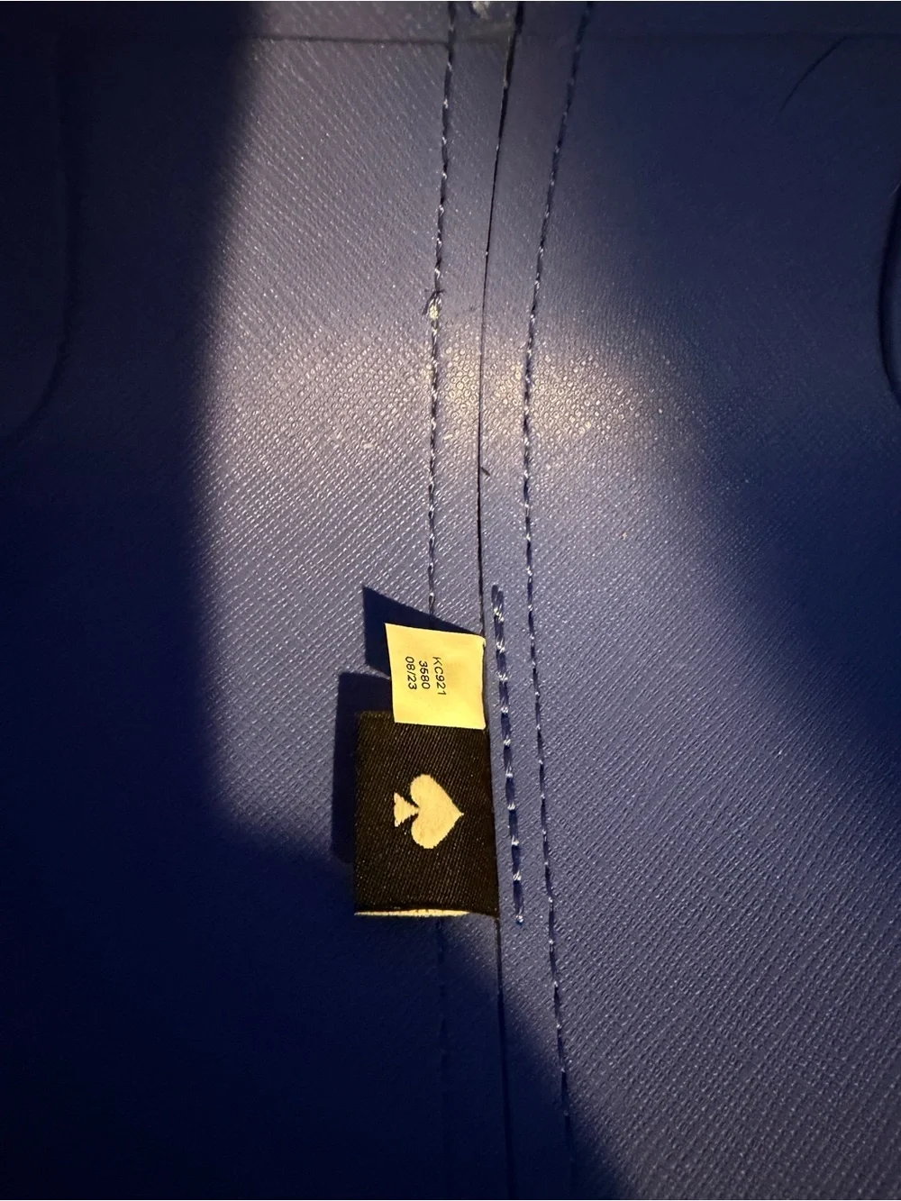 kate spade dark green tote with blue interior